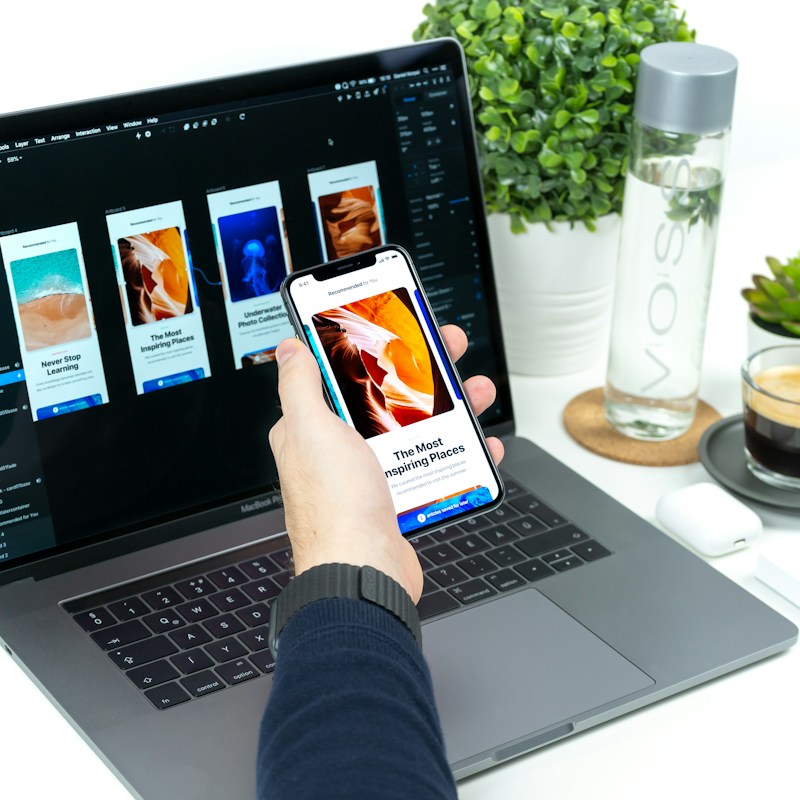 Designer developing clear interface layouts and interaction patterns