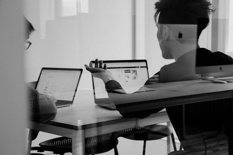 Colleagues examining information to form actionable insights